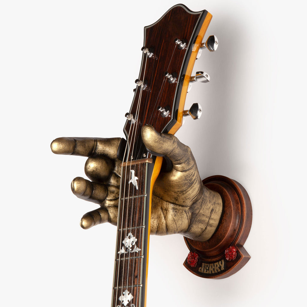 Jerry Garcia Hand Guitar Hanger in gold finish with wood backplate and roses. 