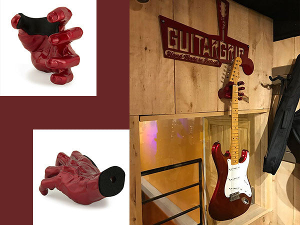 guitar hanger holding red fender stratocaster. Also, 2 red hand guitar hangers.