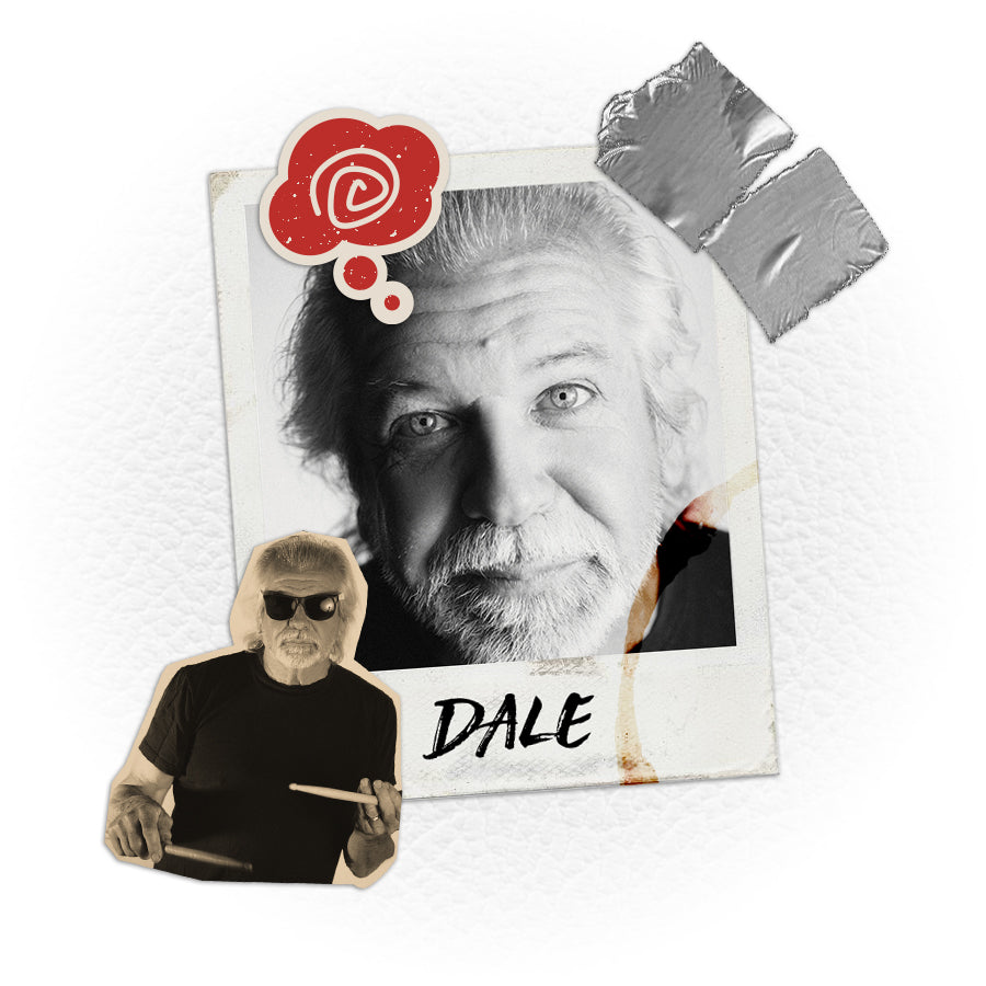 Dale Product Manager. Black shirt holding drumsticks. 