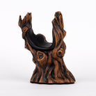 Tree shaped guitar hanger wall display  with bark finish for electric and other acoustic instruments.