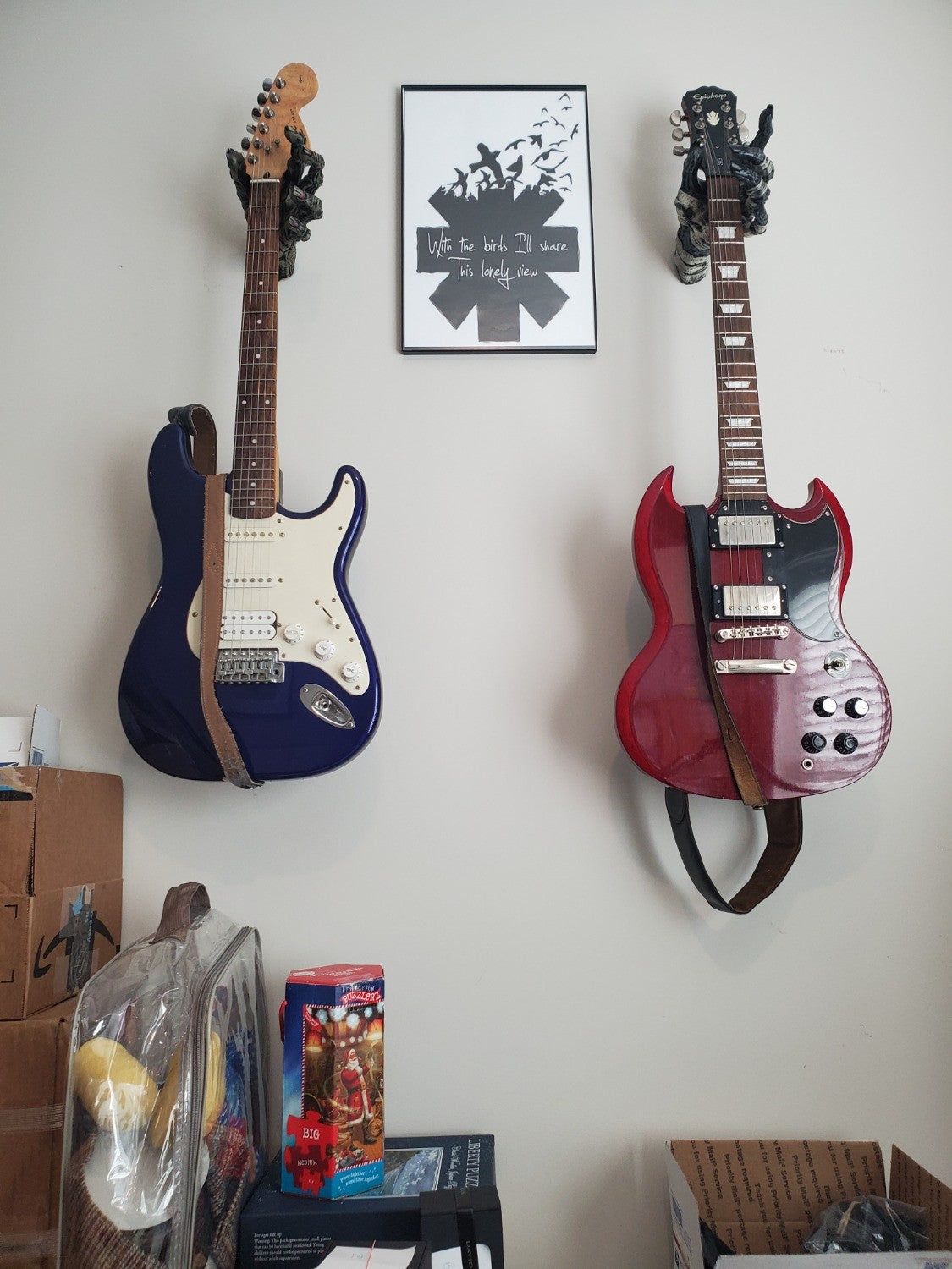 Zombie and mummy hand guitar hanger wall display mounts. 