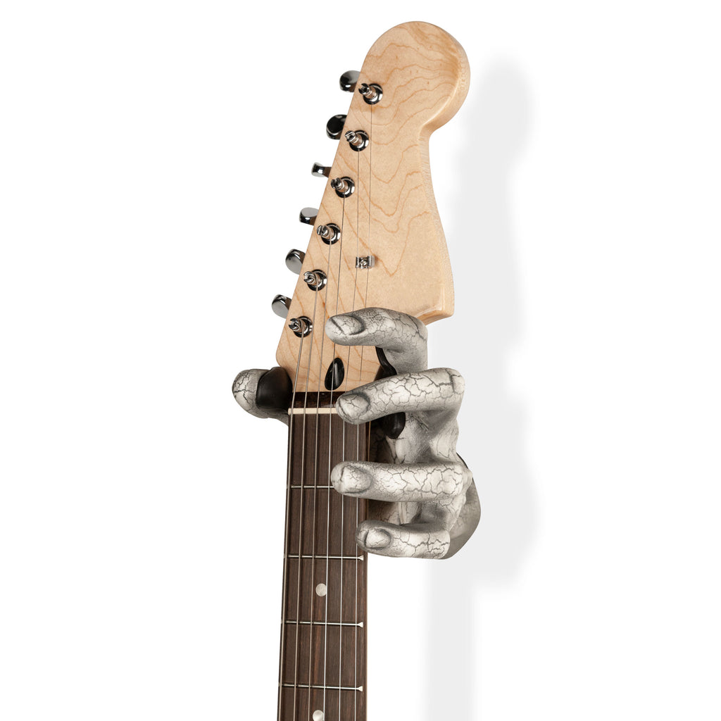 Hand wall mount holding guitar. White crackle finish. 