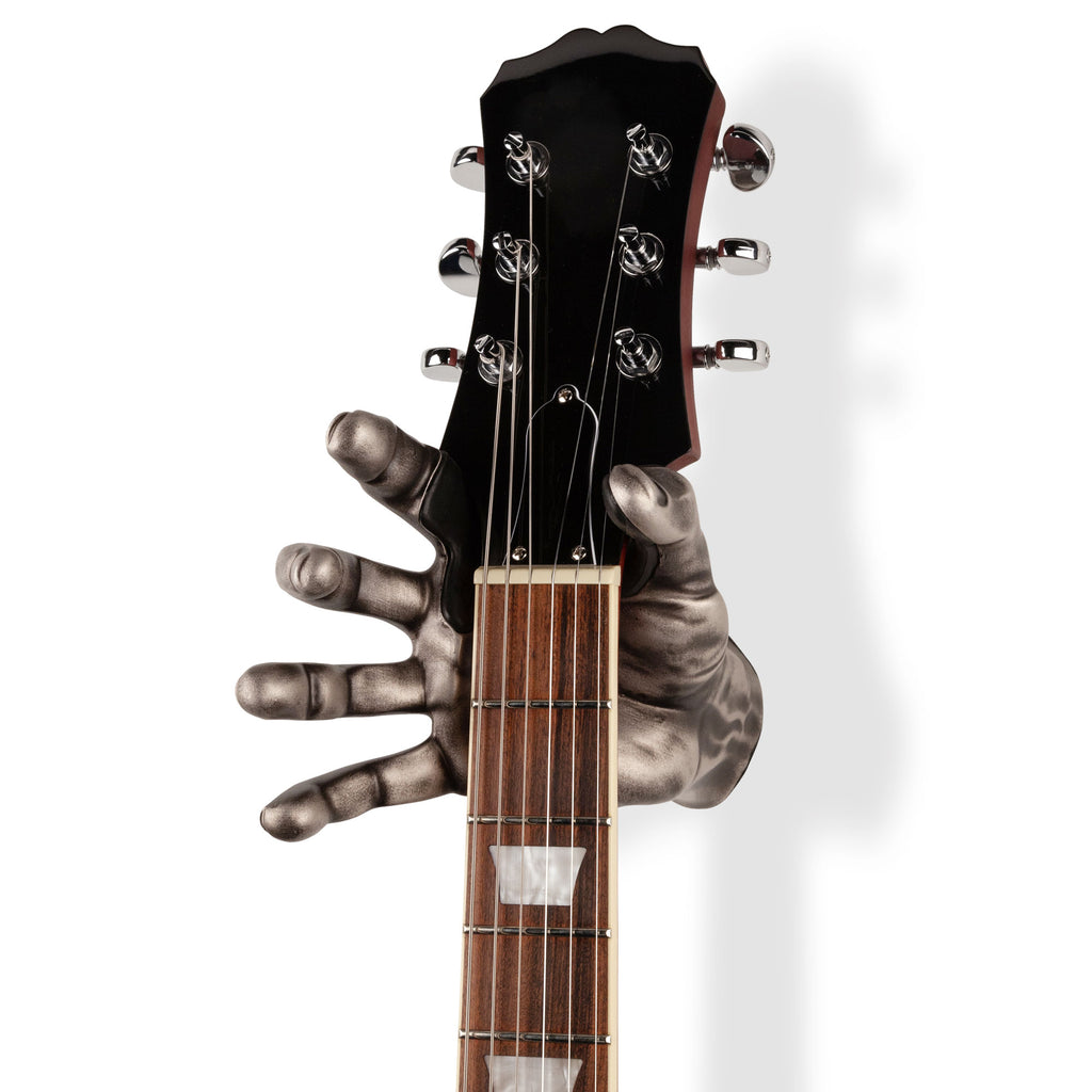 silver hand shaped guitar hanger from guitargrip. 